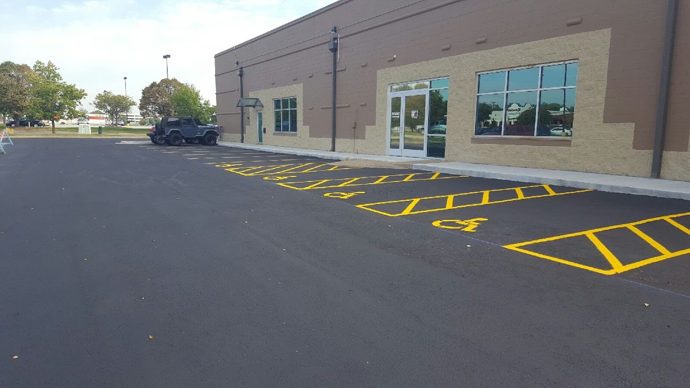 How Does Parking Lot Striping Improve Traffic Flow?